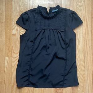 ModCloth high-neck cap-sleeved button-back top